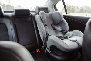 child car seat in the back of a car