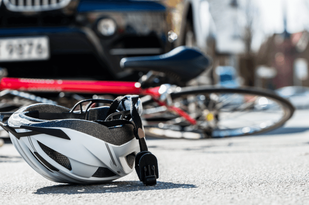 Bicycle helmet on ground after accident